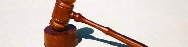 brown wooden tool on white surface