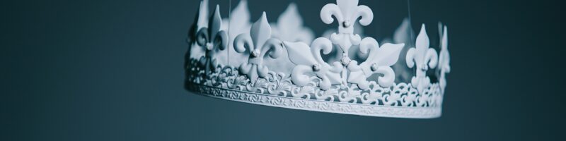 shallow focus photography white crown hanging decor