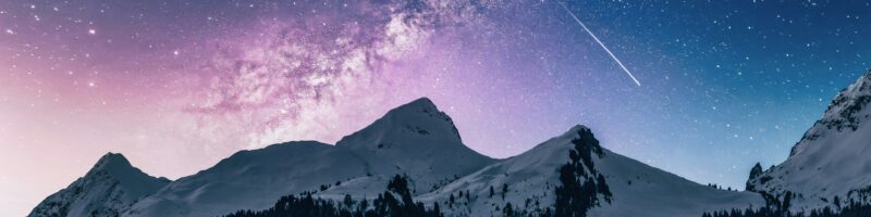 snow mountain under stars