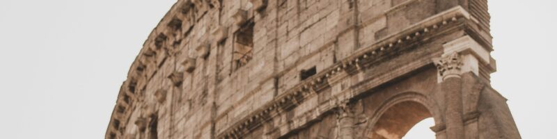 brown concrete building under white sky during daytime