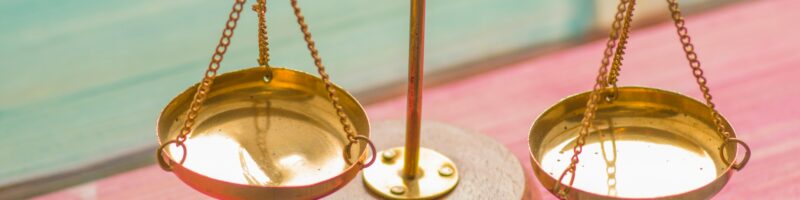 gold and silver round frame magnifying glass