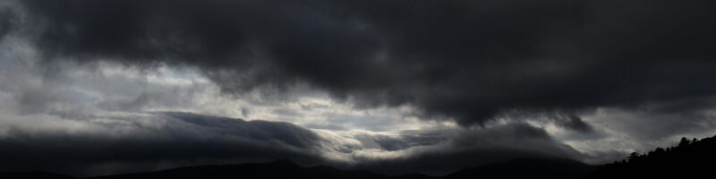 gray clouds over body of water during daytime