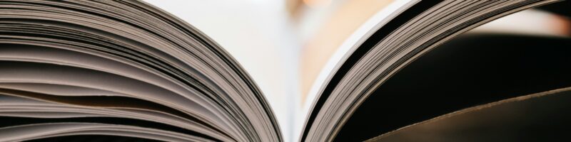 bokeh photography of open book