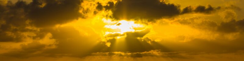 golden hour photography of sky above ocean