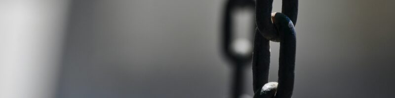brown metal chain in close up photography